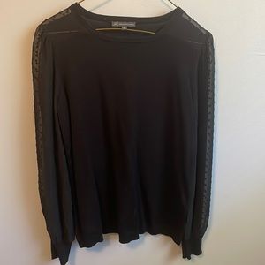 Small sweater with sheer sleeves